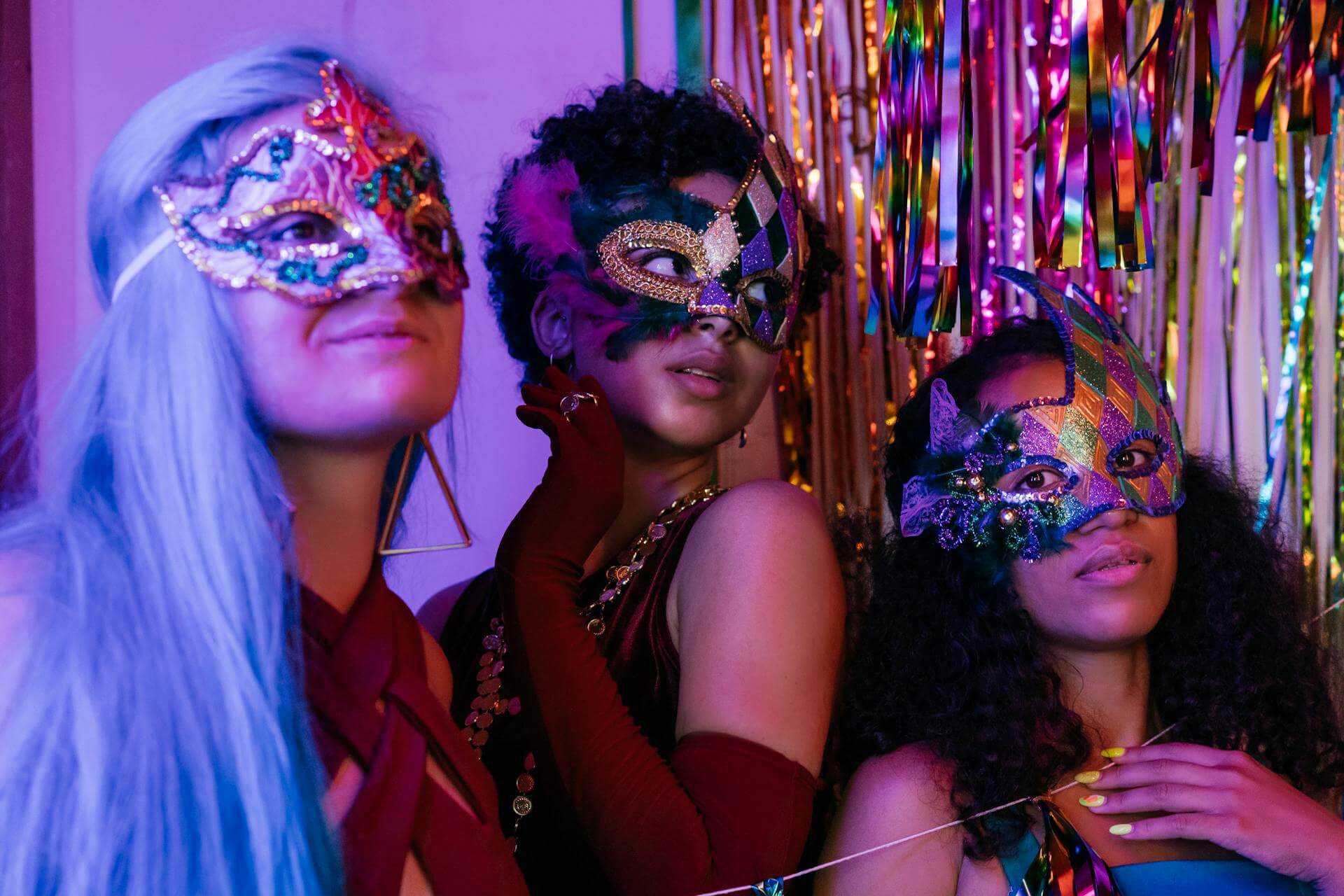 Women wearing colorful masquerade mask pexels mikhail nilov 9391354