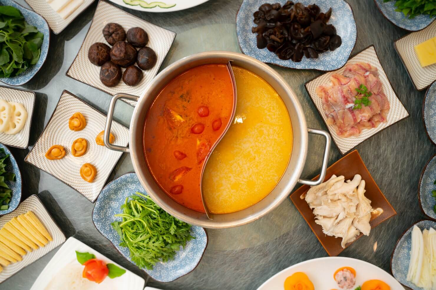 High angle shot soup middle with side dishes
